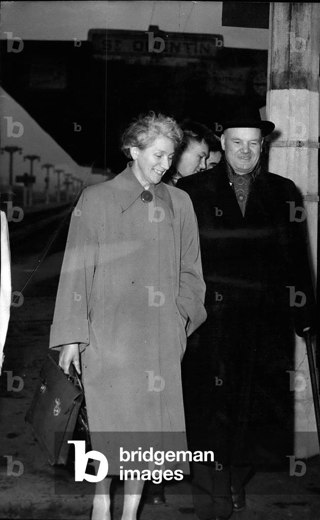 Apr. 04, 1953 - Maurice Thorez back in France: The Communist leader photographed with his wife Jeannette Vermeersch as he got off at saint Quentin (about 100 miles from Paris). Behind (profile) is his son, a school teacher.
