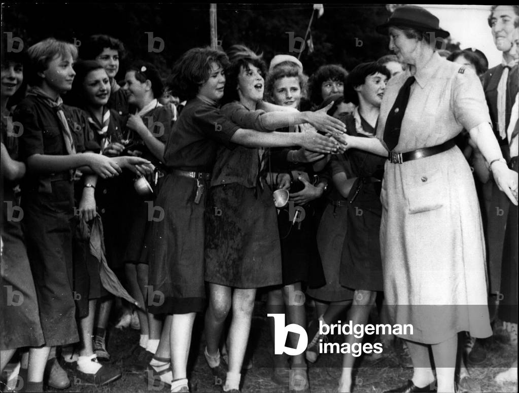Jul. 30, 1953 - Girl-Guides Rally At The Chateau De Jambville (France): 2.400 Young Girl Guides From France And Other Countries Are Gathered At The Chateau De Jambville. This Is The First Big Meeting Of The Girl Guides And Has Begen From Monday And Will Last Till August 4th. Lady Baden Powell, Wife Of The Famous Founder Of Scouts Is Seen Greeting The Young Girl Guides.