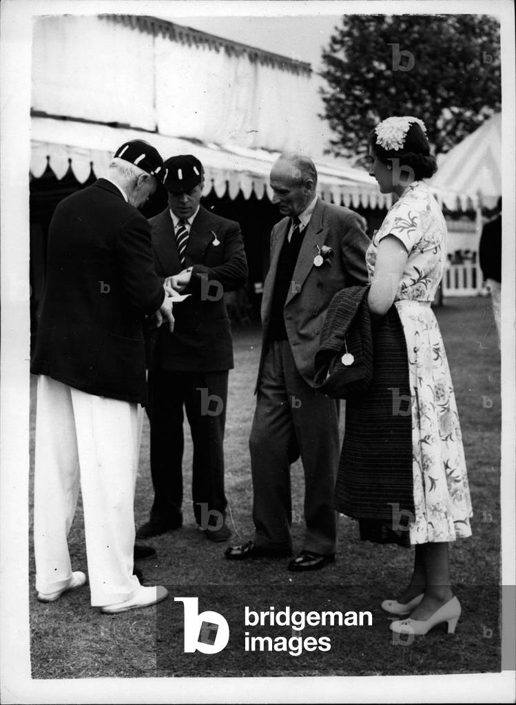 Jul 07, 1953 - Final day of the Henley Regatta - Viscount Montgomery with friends. Keystone Photo Shows: Viscount Montgomery sees as he chats to Mr. C.H. Rew (Vice Pres. London Rowing Club) wearing white trousers; Mr. P.S. Beale (Chief Cashier of the Bank of England) and Miss June Rew -when they attended final day of the Henley Regatta today. JSS/Keystone