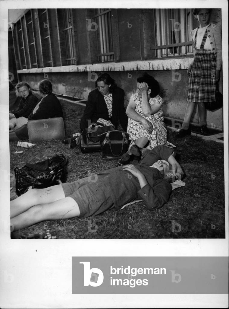 Jul 07, 1953 - Emergency Food Supply For Needy East Berlin Population: Already in the early morning hours of Monday, July 27th, 21953, over 20,000 Hungary and needy from East Berlin lined up before the individual town-halls of the city of Berlin Where food is distributed to them. Many stood hours and hours to receive a package with fat or some cans.