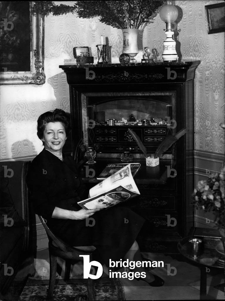 Dec. 12, 1953 - France's Would-Be First Lady: Madame Pourcade, wife of M. Jacques fourcade, V.P., former president of the assembly of the French union, one of the candidates running for the presidency of the French republic tomorrow, Madame Fourcade is seen here in her living room