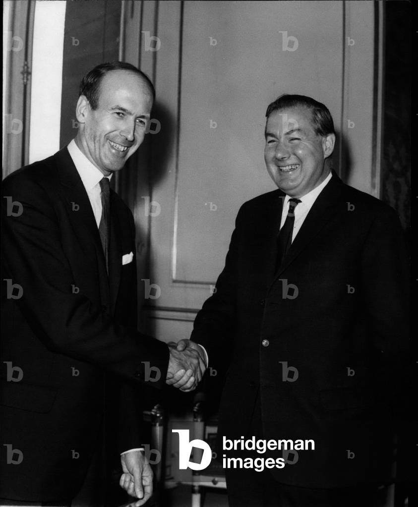 Jul 22, 1965 - Valery Giscard d'Estaing, Minister of Finance and Economic Affairs, and James Callaghan, Chancellor of the Exchequer, shake hands after meeting to discuss reforming the international monetary system
