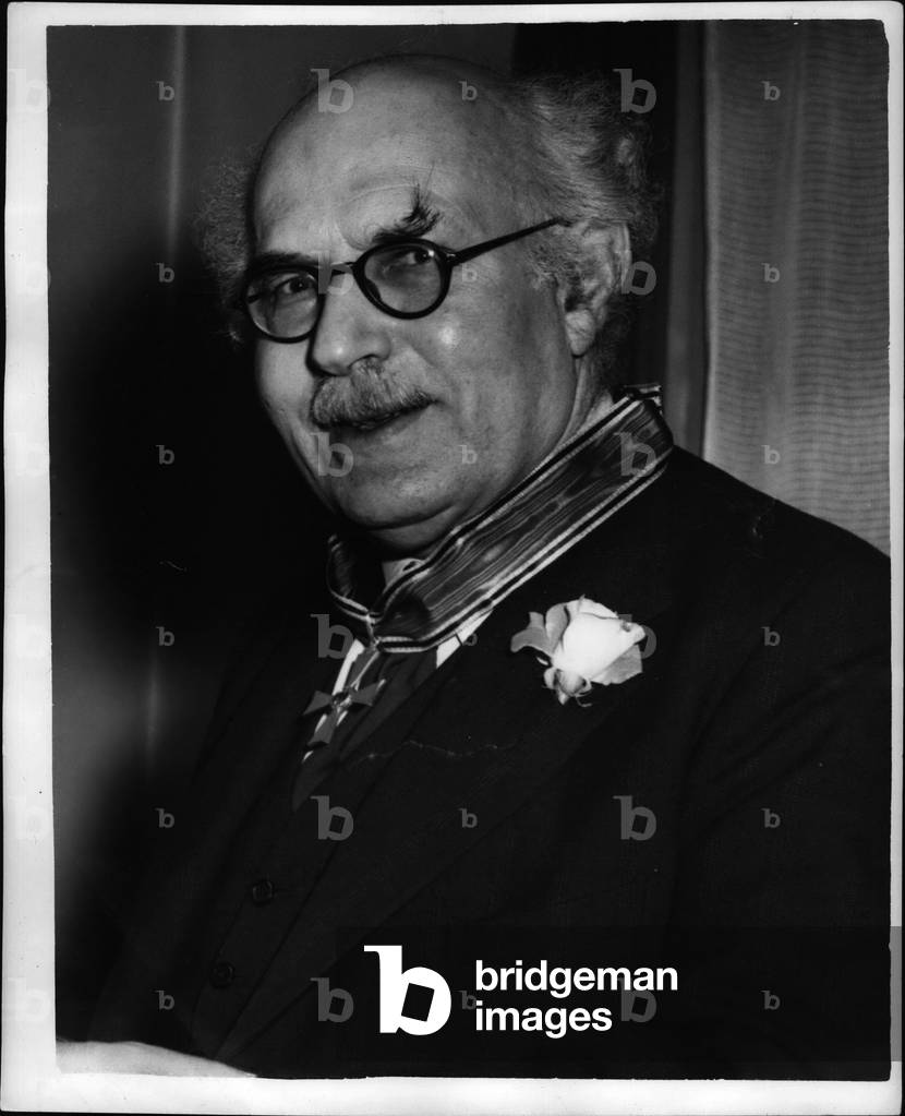 Apr. 04, 1953 - Publisher receives English order of Merit. The German charge d'Affaires in London, Dr. Schliange - Schoningen, today invested the Grand Cross German order of Merit, on Mr. Victor Gollanz, the publisher, on the latter's 60th. birthday, at the German consulate general's office, Rutlend gate