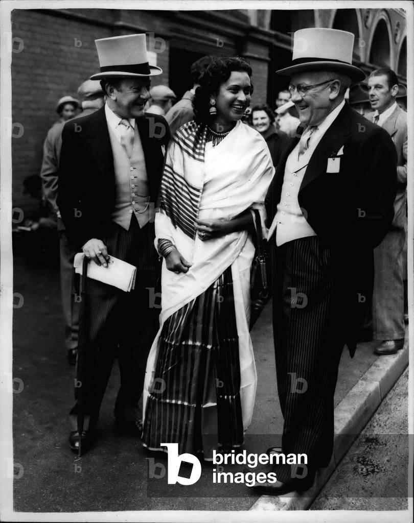 Jun. 06, 1953 - Jack Hylton And The Lady From Ceylon: Photo shows. Bobby Howes; Miss Erif se Delfa of Ceylon-and Jack Hylton the Impressario-seen when they arrived at Ascot today-for the opening of the Royal meeting.