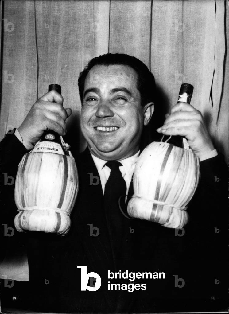 May 05, 1954 - Best Bouk On Travel Abroad Rewarded: Mr. Henri Philippon, Author Of the Four Best Books Of The Year On Travel In Spain, Greece, Austria And Italy, Who Was Awarded The” Grand Prix” Of Tourism. He Received As A Gift At The Same Time Two Bottles Of Chianti