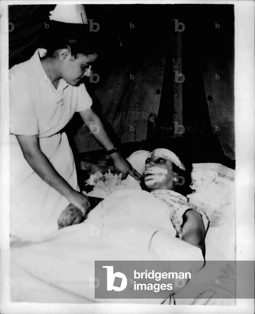 Aug. 15, 1953 - 15-8-53 Greek earthquake disaster latest pictures - Six days after the first shocks, Argostoli, capitol of the Greek earthquake island of Cephalonia, is still burning. Latest figures are that 1,000 people have been killed, 4,000 injured and 10,000 made homeless