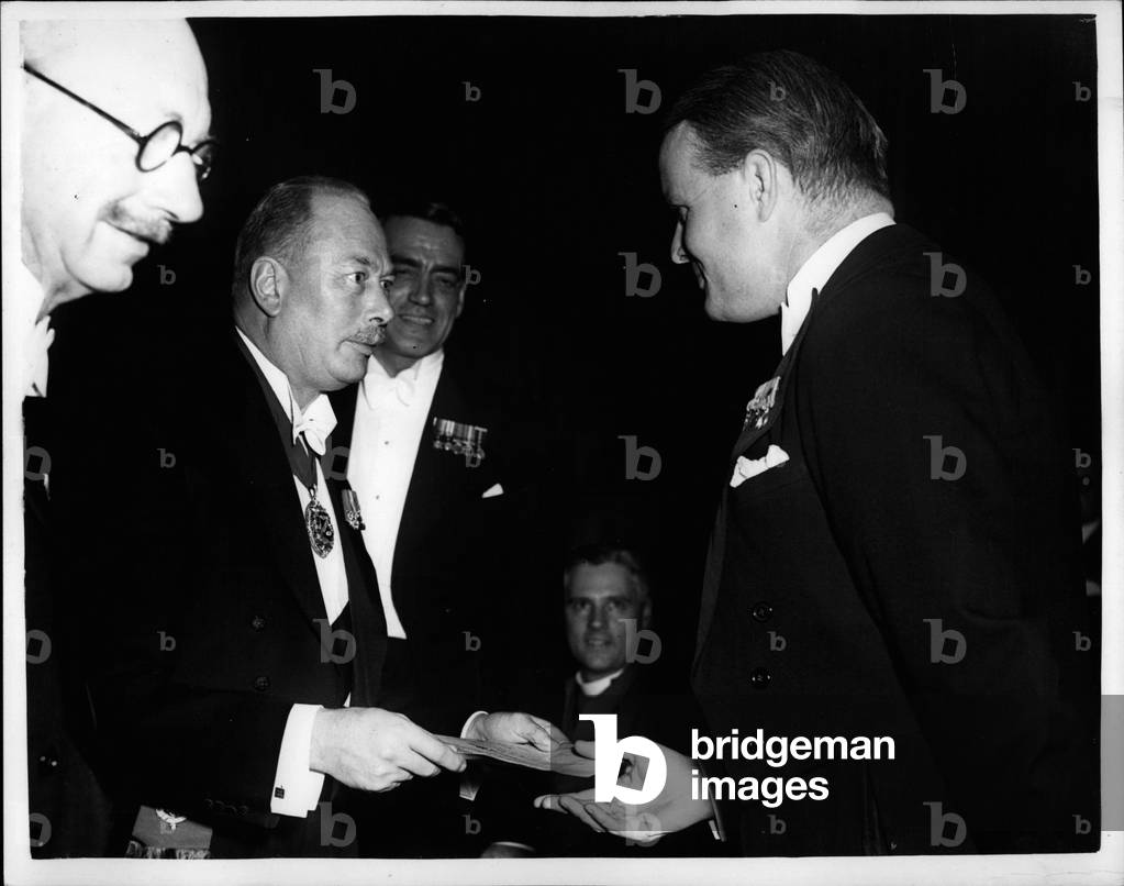 Oct. 10, 1953 - Duke Of Gloucester At Vintage Festival Banquet: The Duke Of Gloucester, the Master of the inter's Company, was the chief guest of honour at last night's Vintage Festival Banquet at the inter's Hall City. Organized by wine and Spirit Association, the five-course banquets the first of its kind to held in Britain. The Duke Of Gloucester presented parchment scrolls to six members of the trade who qualified as” Masters Of Wine” in an examination organised by the associations. One of the them was the Lord Chancellor's 33-year old nephew, Mr. Kenneth Simonds, who is with a West End wine firm