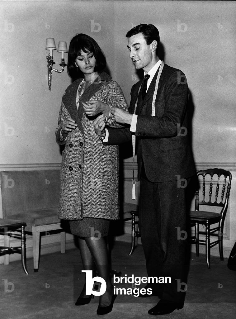 Dec 6, 1961 - Paris, France actress SOPHIA LOREN and stylist GUY LAROCHE taking steps