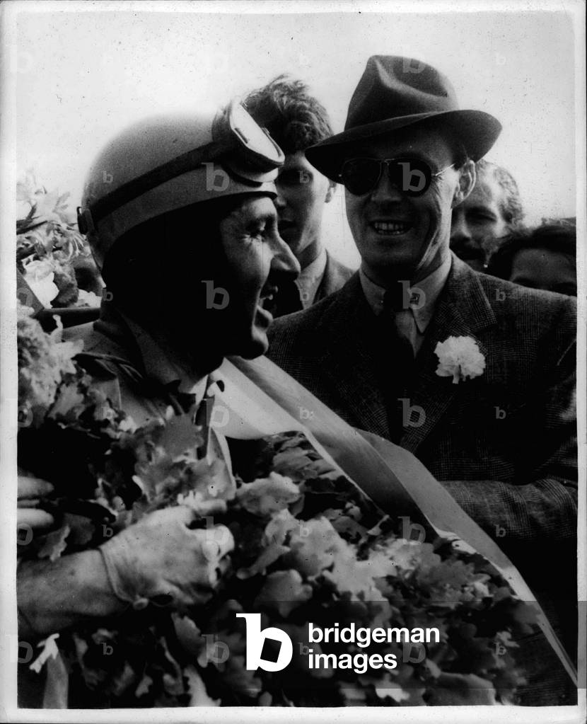 Jun. 09, 1953 - Prince Bernhard of the Netherlands Congratulates Ascari - Winner of the Granprix.: Prince Bernhard of the Netherlands congratulates Ascari - after the latter had won the Gran Prix of the Netherlands on the Circuit of Zandvcort. Holland.