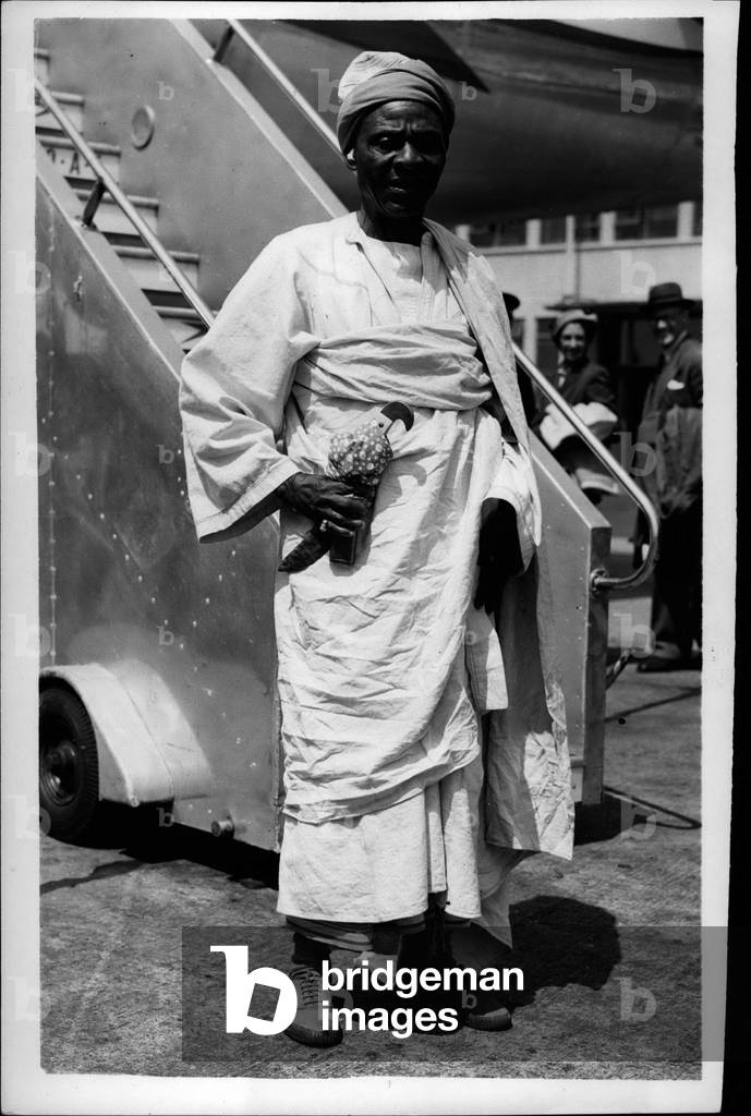 May 05, 1953 - Arrivals at London airport for the Coronation: Chief Kawanga from Nyasaland.. Picture Shows Chief Kawanga seen on his arrival at London Airport today. He comes from Nyasaland and is here for the Coronation.