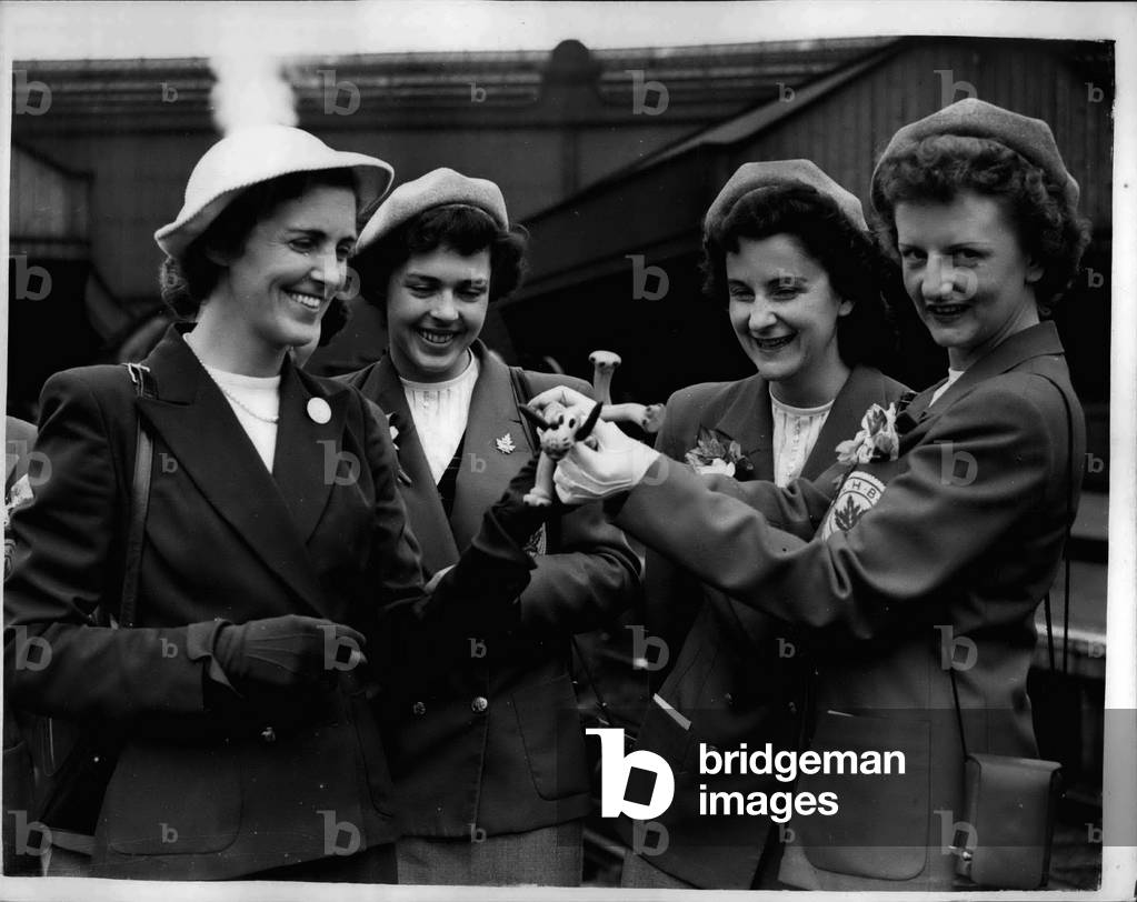 May 05, 1953 - Canadian Girls Arrive for Health and Beauty Display Prunella stack looks at” Pluto”.: Prunella stack the famous leader of the Health and Beauty league - went to Waterlco station tihs morning to great the Canadian Contingent of the League in roodiness for the Health and Beauty Display to be given at the Royal Albert Hell