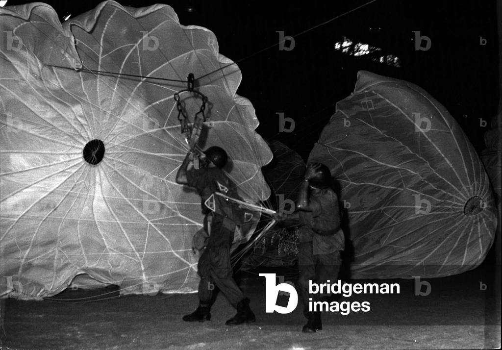 Jul. 04, 1953 - Army Show at Palais Des Sports. A display of paratroopers seen at the one week army show now being held at the Palais Des Sports, Paris.