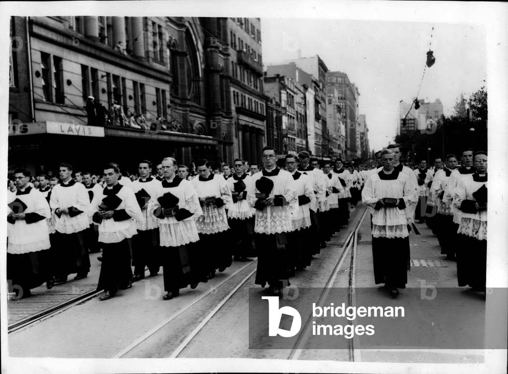 Apr. 25, 1953 - Eucharistic procession in Australia: 21,000 people took part in the recent Eucharistic Procession through the streets of Sydney, Australia, and an estimated crowd of 150,000 gathered in Hyde Park Chere, to listen to the Papal Delegate (Cardinal Gilroy), make his final speech from the steps of St. Mary's Cathedra