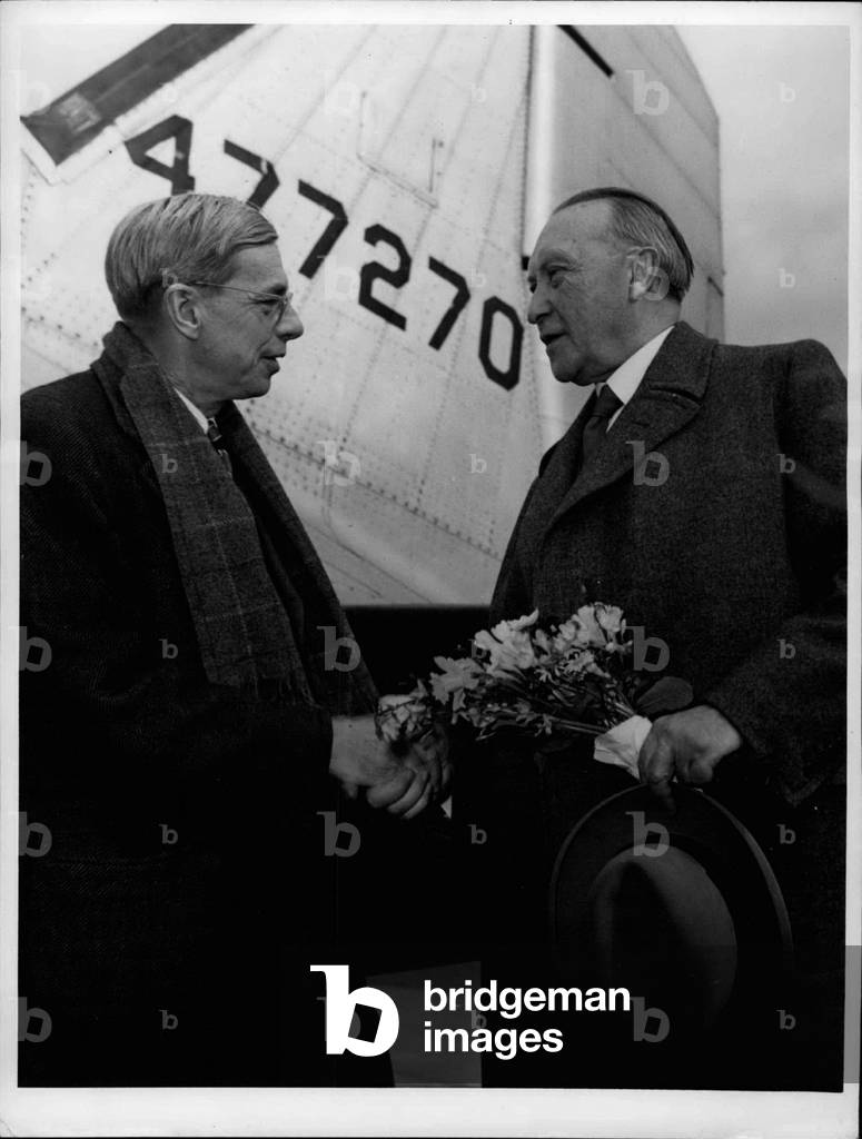 Apr. 01, 1953 - American High Commissioner Conant sees off Chancellor Adenauer at the Koelner-Bonn Airport. Chancellor Adenauer is heading to America.