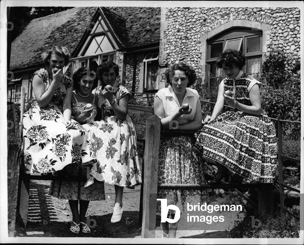 Jul 07, 1953 - Village of Beautiful Girls- Girls Outnumber men by Four to one: Bramber with a population of 400 is decreed in guide books as one of the most picturesque villages in Sussex. But it isn't one of the most romantic. The reason for that is because there is only one eligible bachelor for every four of its glamorous girls. Mrs. Peggy Glenie, manageress of the Castle Hotel said, “The shortage of men is terrible”. Every evening groups of two or three girls go into Mrs. Glene's her just to pass away the time. Their other sources of amusement are nearby river, a ruined castle and a hall - and a deserted Lover's Lane. Some of the young man of the village are lured away by the towns when they start work, but return to claim their childhood sweethearts. But with that four-to-one ratio there are a lot of girls without sweethearts to return. The reactor, The Rev. Ernest Street has about 25 wedding a year in Bramber and adjoining village of Beeding