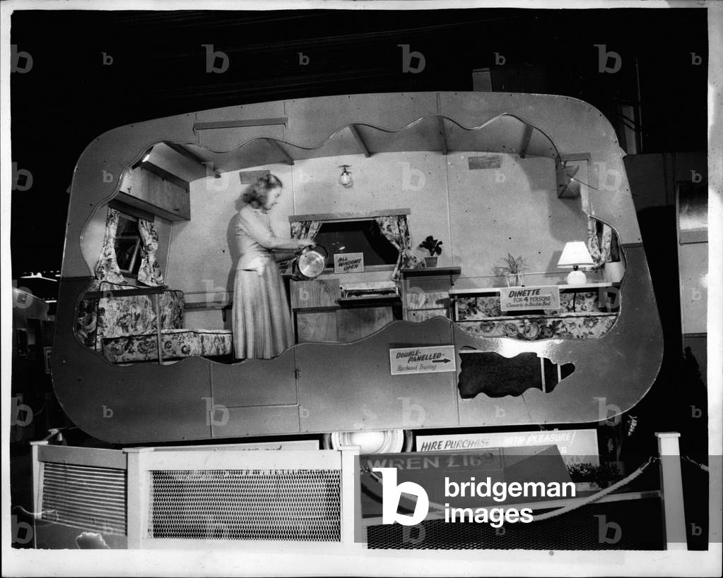 Tue. 03, 1953 - Preview of the Ideal Home Exhibition... Lightweight Caravan for Four. Keystone Photo Shows: Sectional view of the” Wren” 12 ft x 6 ft 6 ins Holiday Van - made by Bluebird Caravans Ltd... It is a Lightweight job and is priced at 69 - and is seen at the Ideal Home Exhibition which opens tomorrow at Olympia.
