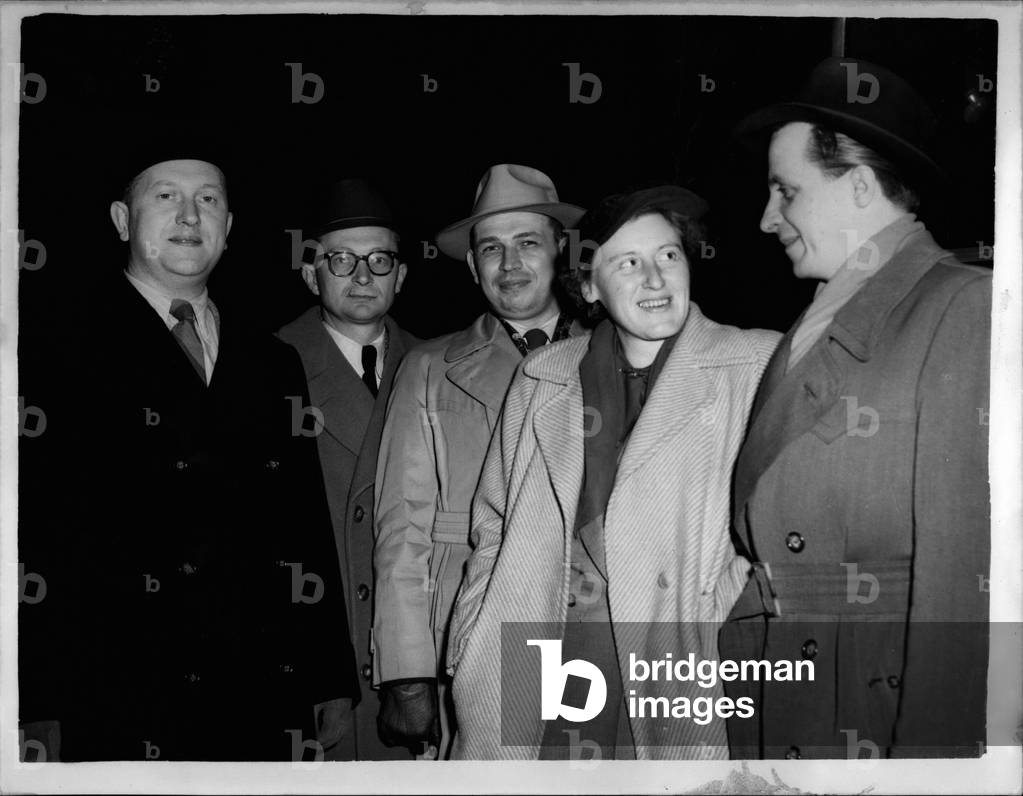 Apr. 04, 1953 - German Politicians arrives in London. Five young German Politicians arrive in London this morning to spend two weeks here as guests of the Foreign Office. They are from the British Zone in Germany and they will be introduced to” the British way of life”.Photo shows (L to R) Herr. Rudolf Dellinger Robert Doescher, Max Lotz, Frau Doris Zintz (the only woman in the party) and Claus Maus, pictured on their arrival at Liverpool street Station this morning.