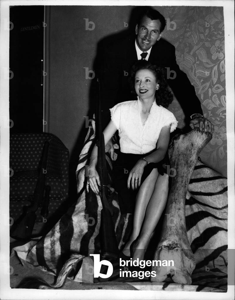 Nov. 11, 1953 - Press reception for Screen stars returning from location in Africa.: A reception was held this afternoon at Stratford Court, Oxford Street for screen stars John Calvert and his wife Ann Cornell who have just returned to this country after filming 'Africa's Strange Horizons' in Africa during which they trekked over 800 miles to find the right rentals