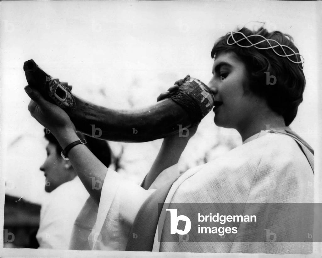 Tue 20, 1953 - Ancient Druid Ceremony On Tower Hill The Druid Has A Drink: For the first time for 162 years the white robed members of the Druid Order - held an ancient ceremony - to mark the coming of Spring on Tower Hall - The Ceremony is similar - but on a smaller scale to the Stonehenge Ceremony, It is reputed than an ancient Brion Burial ground is beneath The White Tower