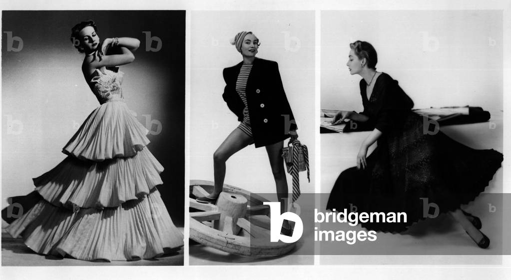 Jun 06, 1953 - A Vacation in WOOL: For those who will be trading the city's hest for cool vacations in the country this summer, three of London's top designers have produced fashions in wool to fill every wardrobe need, from the most delicate and gossamer like evening wear to heavy clothes for hard outdoor use. Below are three models from the collections of Michael Sherard, Jaeger and Madeleine. Pictures shows Left Shell-pleated white wool taffete evening gown by Michael Sherard. The bodice is embroidered in mother-of-pearl. Center: Yachting outfit by Jaeger consisting of a Navy blue roofer and hat, shorts, T-shirt and scarf in matching red and white striped wool jersey. Right: Midnight blue ballet-length hand knitted cocktail dress and stole by Madeleine.